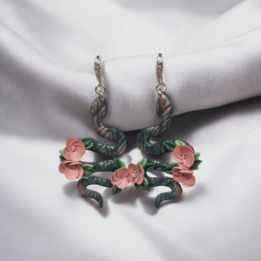 Serpentini floreali con base argento